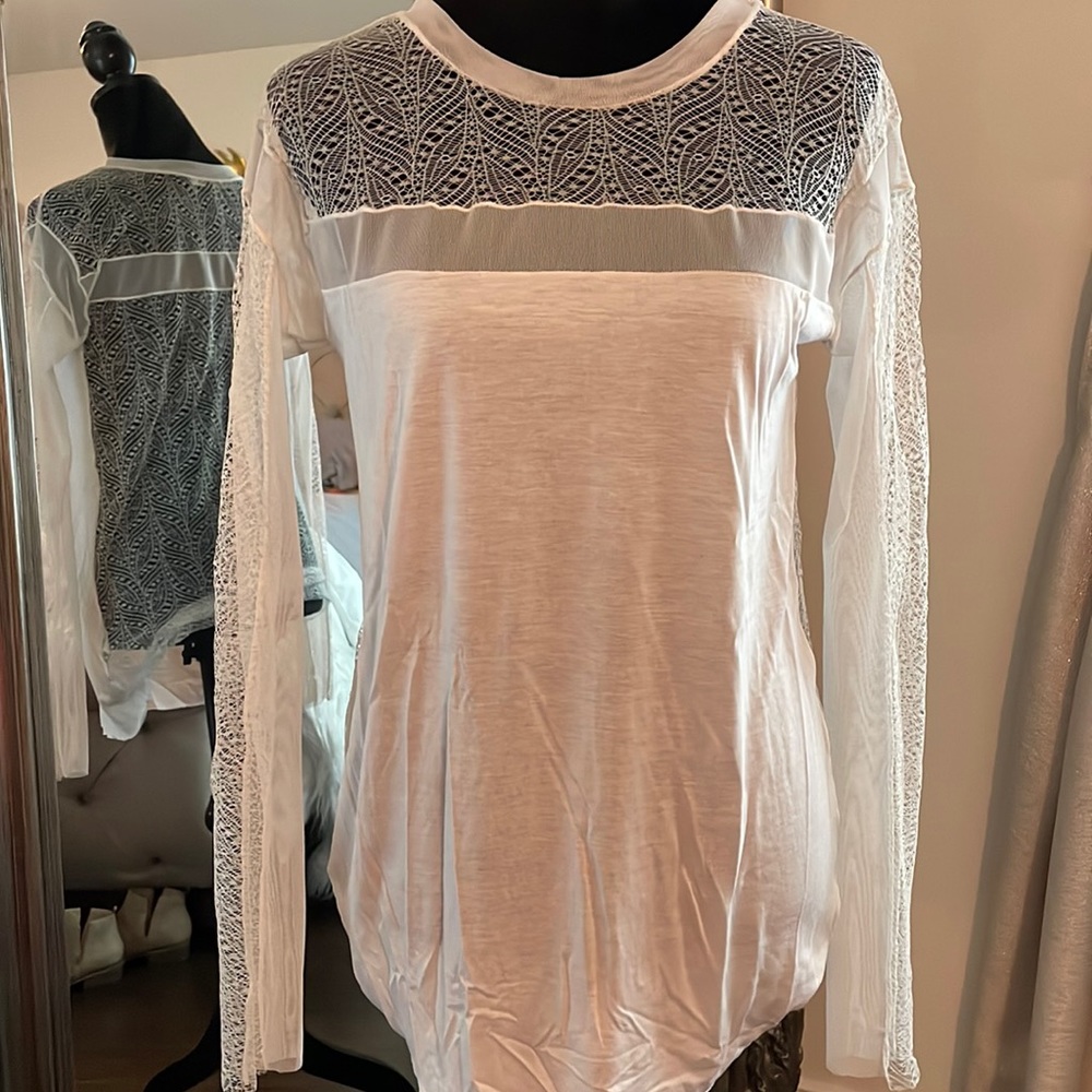 Sexy white lace top. Entire back and arms are lace.